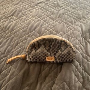 Authentic Consuelo medium size make up bag in dis- continued snake print.